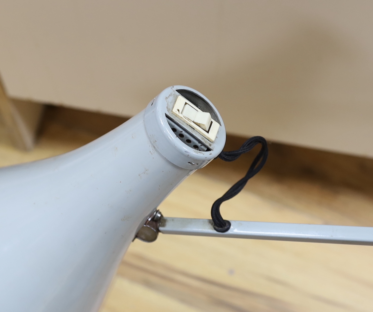 A grey anglepoise lamp